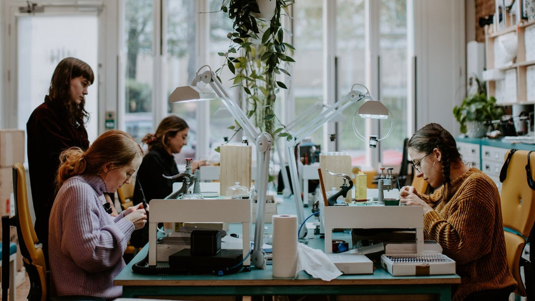 technicians making watches in workshop