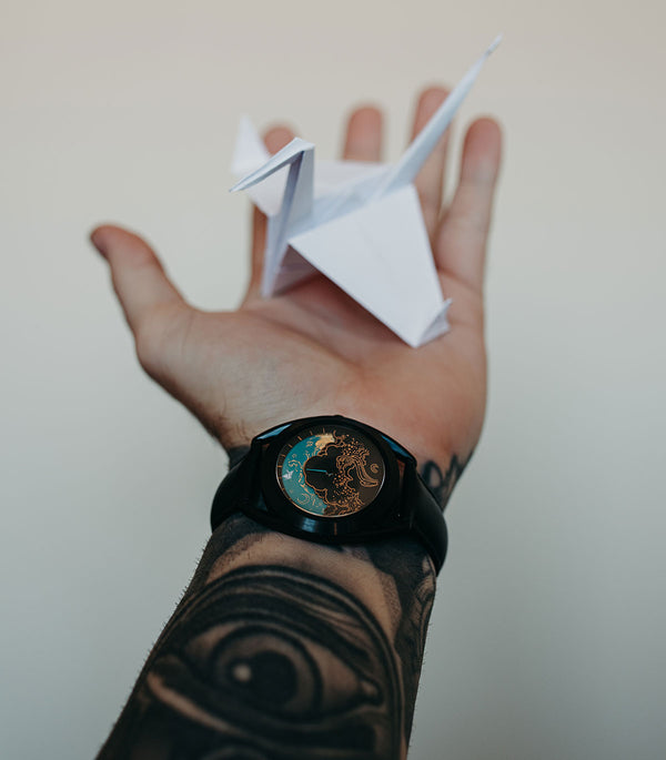 Paper Crane watch on wrist
